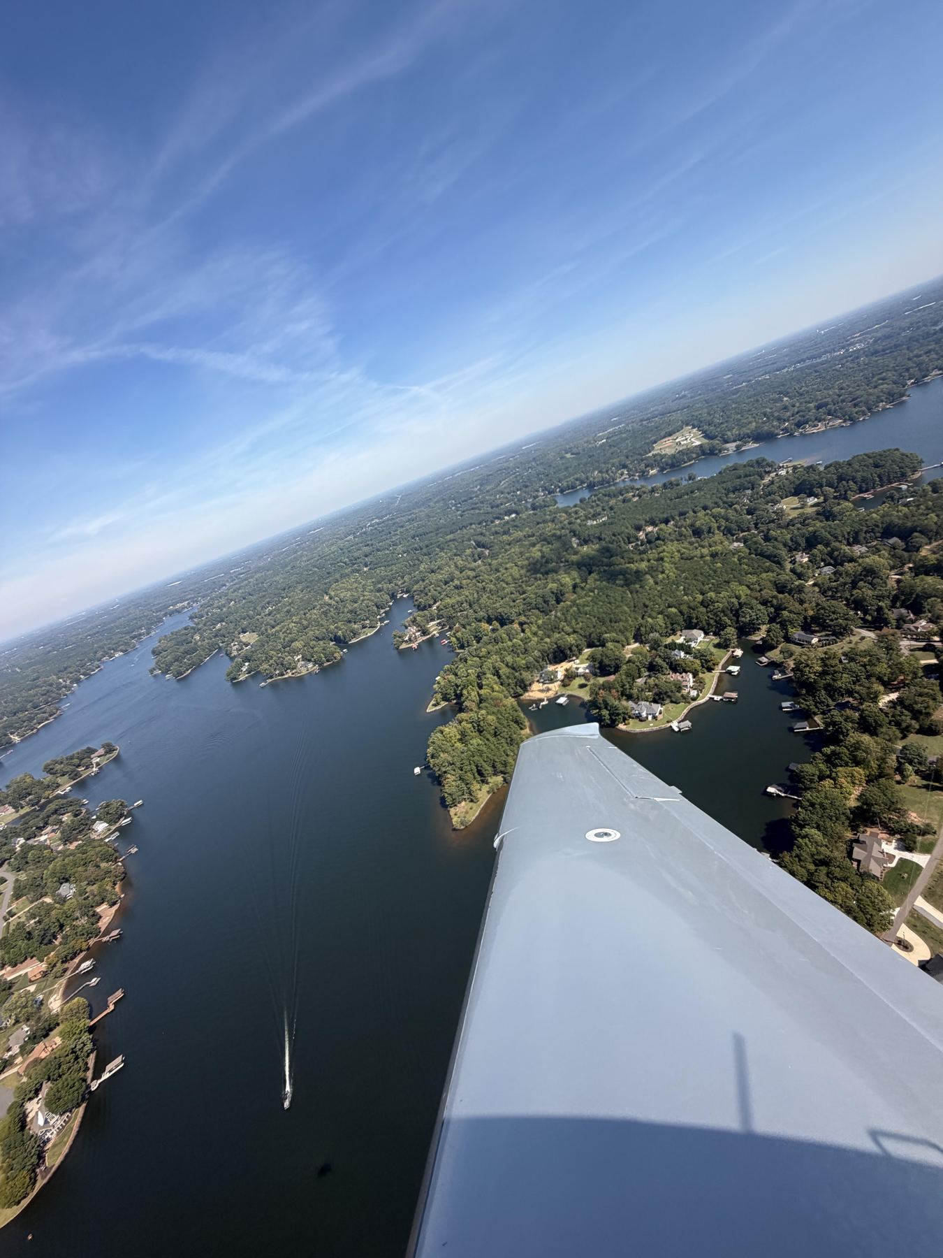 Cirrus wing over Lake Norman