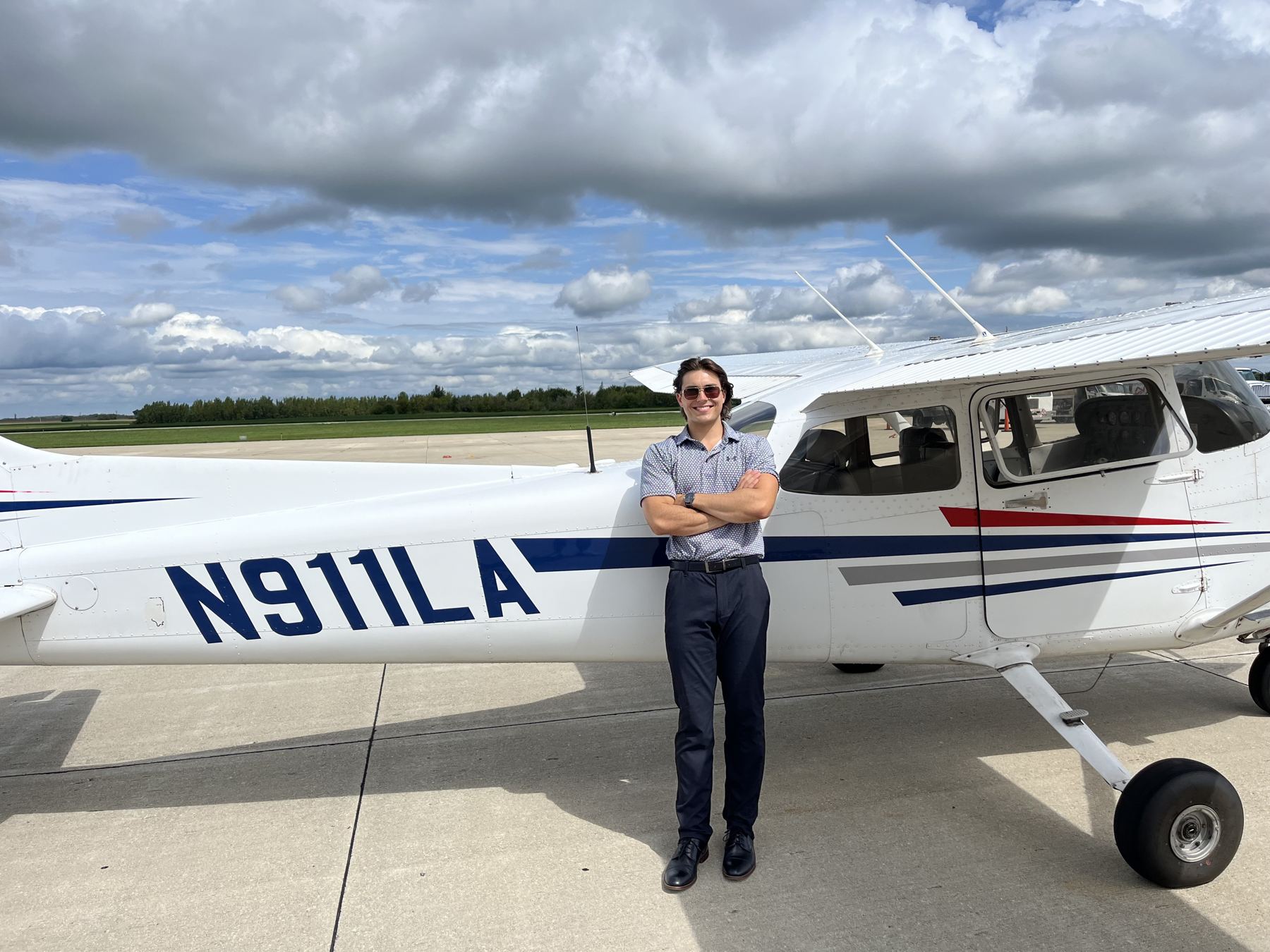 Ryan Park standing beside a Cessna 172 on the ramp